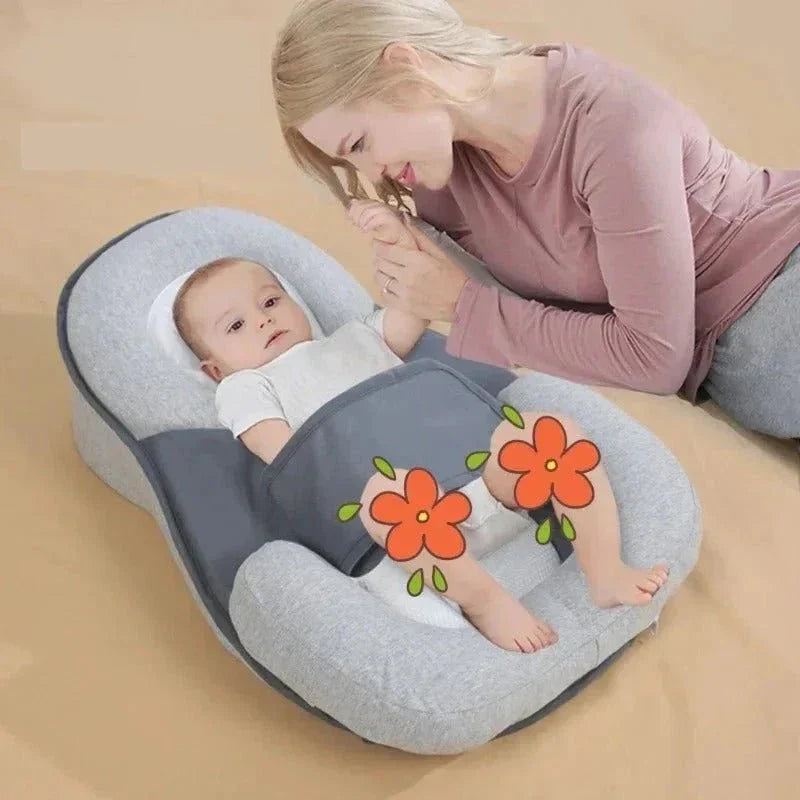 Babywig voor het ledikant